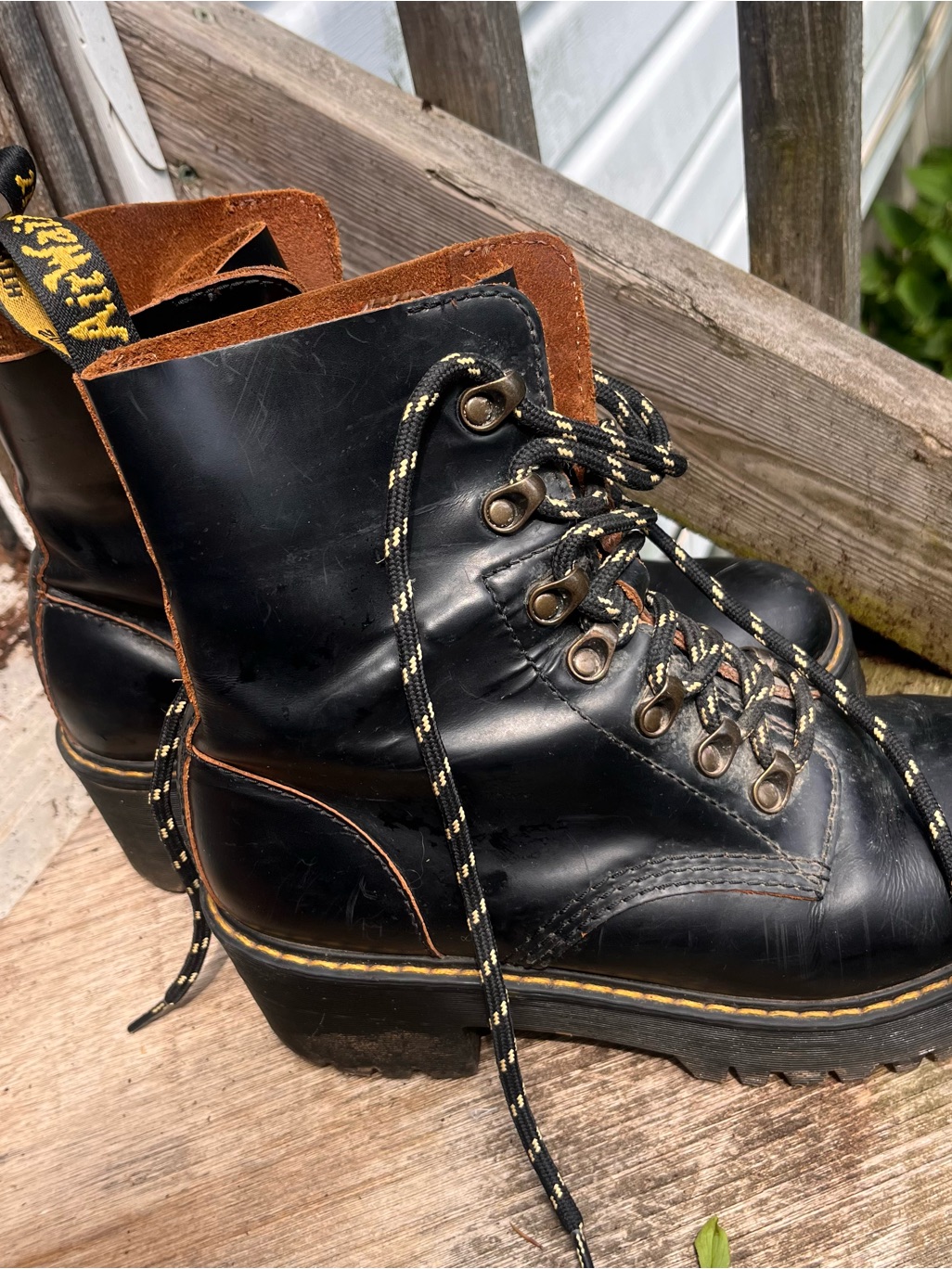 Dr. Martens Leona Black Leather Lace-Up Platform Boots With Brown Trim